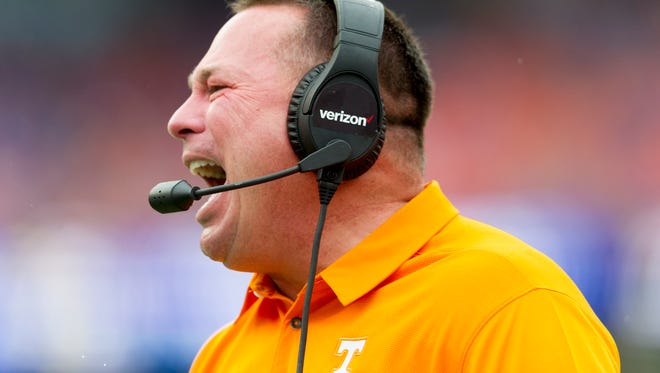 Tennessee Head Coach Butch Jones yells to the field during the Tennessee Volunteers vs. Florida Gators game at Ben Hill Griffin Stadium in Gainesville, Florida on Saturday, September 16, 2017.