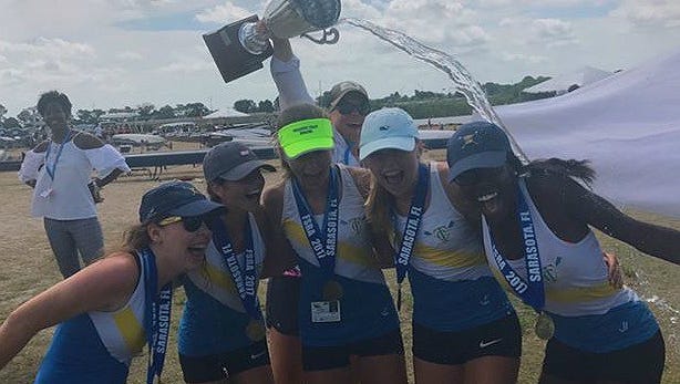 The Treasure Coast Rowing Club Juniors girls freshman four celebrate after winning the Florida Scholastic Rowing Association State Sweep Championship on Sunday in Sarasota.