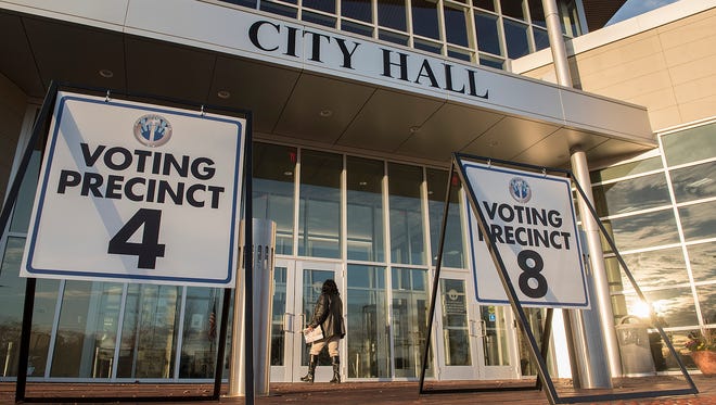 On election day, some voters head to Westland City Hall to cast their ballots.
