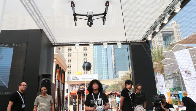 Drones and robotics are seen on display at the 35th GITEX Technology Week at Dubai World Trade Centre on October 20, 2015 in Dubai, United Arab Emirates.
