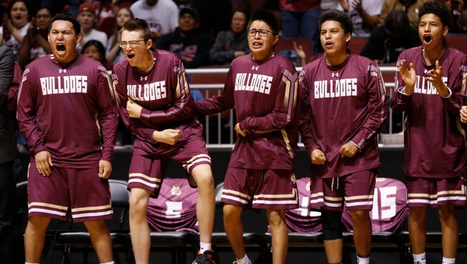 Winslow's bench reacts as they score against Blue Ridge during the first half of the 3A Boys State Championship at Gila River Arena on February 26, 2018 in Glendale, Ariz. 