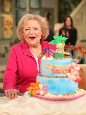Actress Betty White poses at the celebration of her 93rd birthday on the set of "Hot in Cleveland" held at CBS Studios - Radford on January 16, 2015 in Studio City, California.