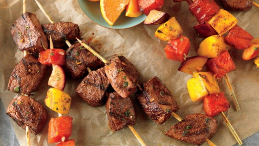 Citrus-marinated beef
and fruit kabobs