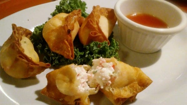 Zen of Sushi's  Krab Rangoon, fried gyoza wrapper filled with shredded imitation crab, rich cream cheese, scallion and hints of garlic. The sweet chili sauce was perfect for dipping.