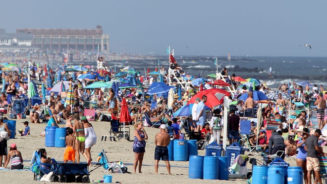 People fill the Avon beach on Labor Day 2017.