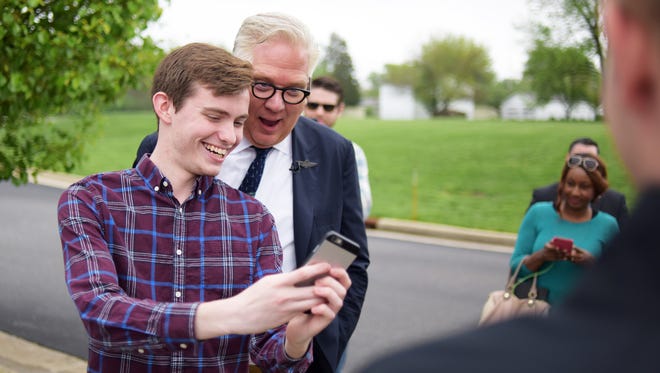 Glenn Beck stops to take a selfie with a fan before a Ted Cruz campaign rally May 1 at Faith Community Center in Lafayette.