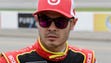 Kyle Larson looks on after qualifying, Friday, June