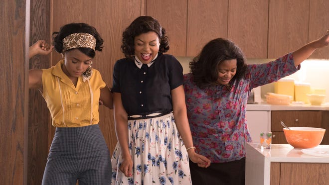Mary Jackson (Janelle Monae, left), Katherine Johnson (Taraji P. Henson) and Dorothy Vaughan (Octavia Spencer) celebrate their stunning achievements in one of the greatest operations in history.