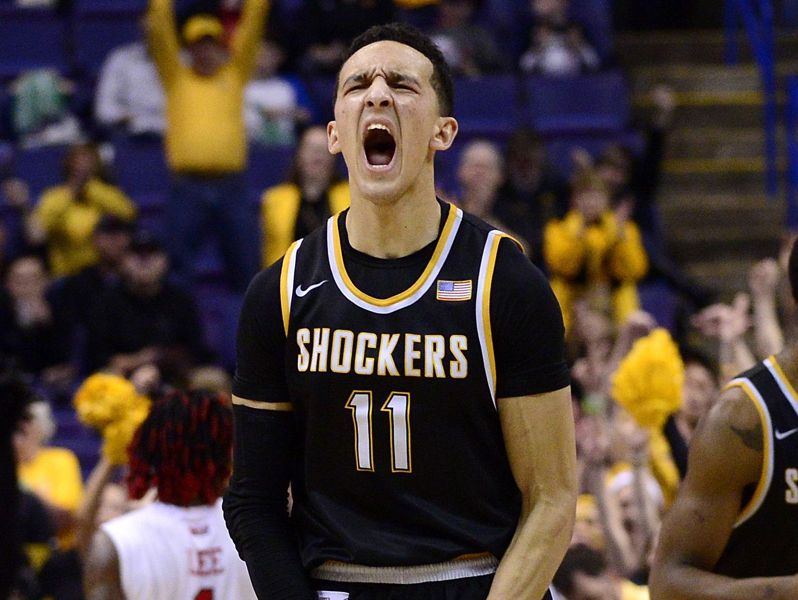 Wichita State Shockers guard Landry Shamet (11) celebrates after scoring against the Illinois State Redbirds during the second half of the Championship game of the Missouri Valley Conference Tournament at Scottrade Center. Wichita State won 71-51.