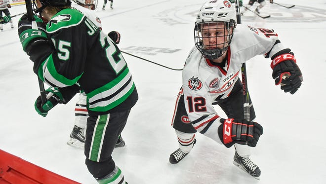 St. Cloud State's Jack Ahcan works near center ice during the first game of the NCHC Frozen Faceoff Friday, March 16, at the Xcel Energy Center in St. Paul. 