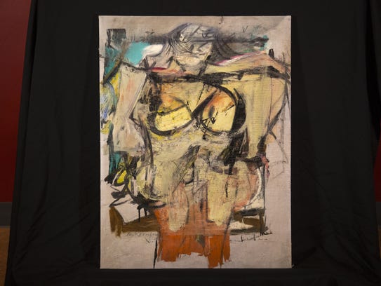 Willem de Kooning's "Woman-Ochre" painting on display,