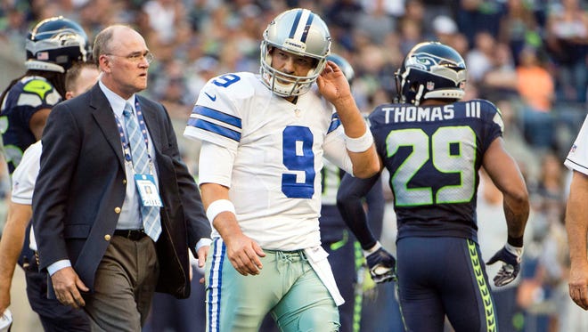 Cowboys QB Tony Romo leaves Thursday night's game after injuring his back.