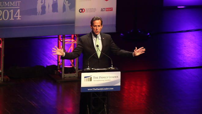 Rick Santorum speaks during the Family Leader Summit in Ames on Saturday, Aug. 9, 2014.