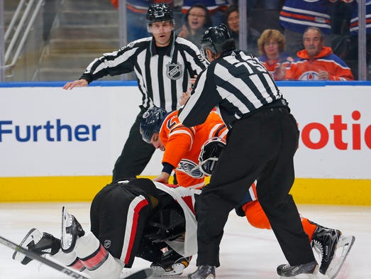 Oct. 14: Edmonton Oilers forward Milan Lucic (27) fights