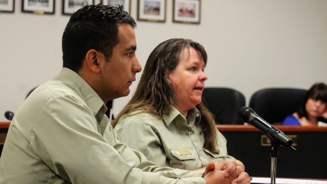 Deputy District Ranger Andres Bolanos and Sacrament District Ranger Beth Humphrey discuss the Southern Sacramento Restoration Project at the Feb. 9 regular county commission meeting.