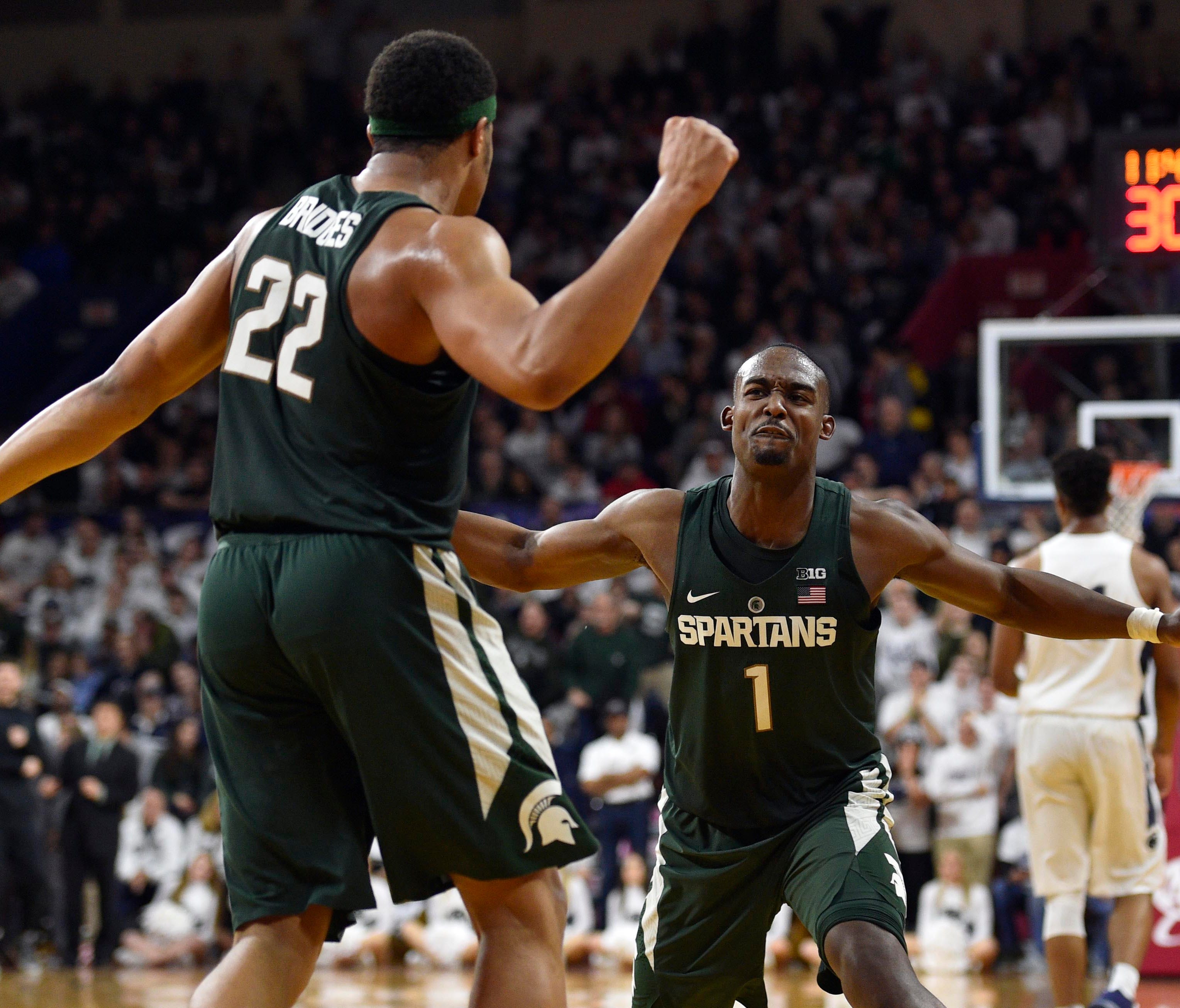 Michigan State Spartans guard Miles Bridges (22) celebrates a blocked shot with guard Joshua Langford (1) during the second half against the Penn State Nittany Lions at Palestra. Penn State won 72-63.