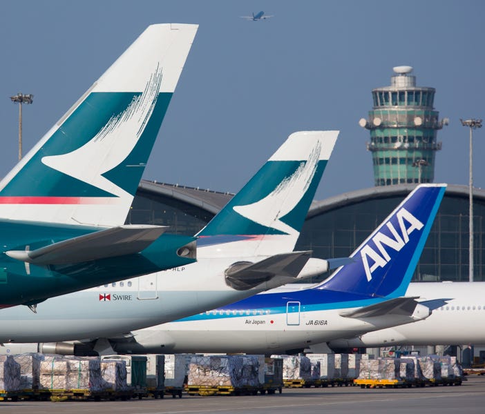 Airplanes are prepped for departure from Hong Kong's international airport in August 2017.