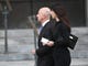 Jeff Bezos and his wife MacKenzie Bezos approached