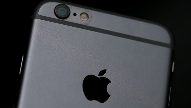 The Apple logo is displayed on an iPhone 6 on July 21, 2015 in San Francisco.