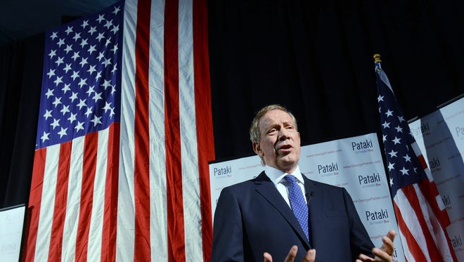 George Pataki speaks with the media prior to announcing his candidacy for the 2016 Republican presidential nomination on May 28, 2015, in Exeter, N.H.