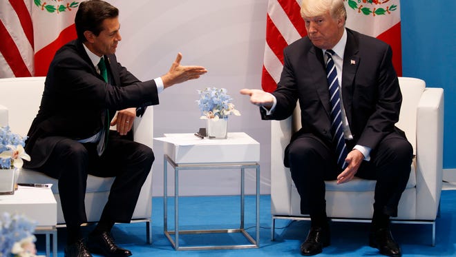 President Donald Trump meets with Mexican President Enrique Pena Nieto at the G20 Summit, Friday, July 7, 2017, in Hamburg, Germany