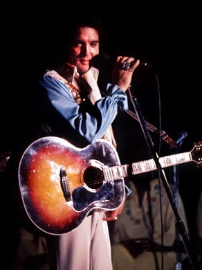 Elvis Presley performs what would be his last Memphis concert July 5, 1976, before a crowd of 12,000 at the Mid-South Coliseum.
