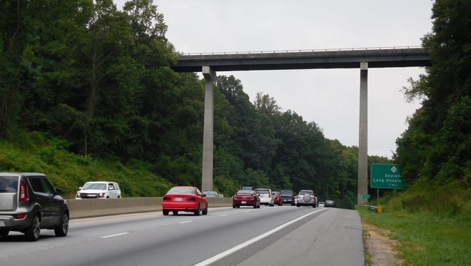 Traffic streams under the Blue Ridge Parkway over Interstate 26 in southern Buncombe County in this file photo. The road is scheduled to be widened as part of the state Department of Transportation's master plan to be discussed Tuesday.