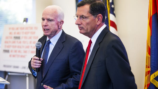 Sen. John McCain and Sen. John Barrasso of Wyoming  conduct a town hall on Obamacare at the Phoenix Better Business Bureau on  Sept. 16, 2016.