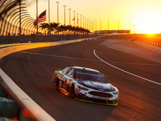 Kevin Harvick races during the Ford EcoBoost 400 at