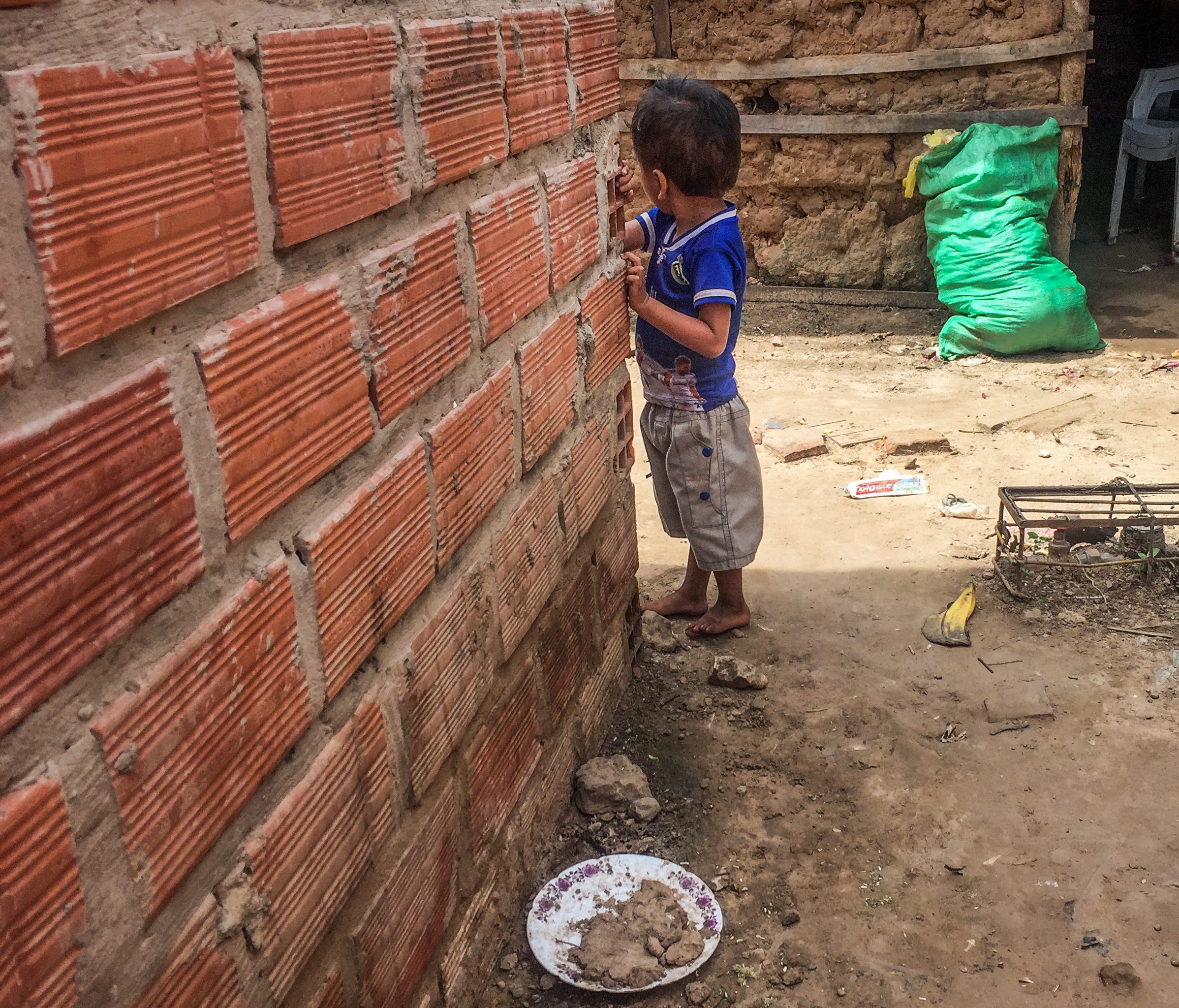 A child plays in an Ayoreo village on the edge of Santa Cruz de la Sierra, Bolivia.