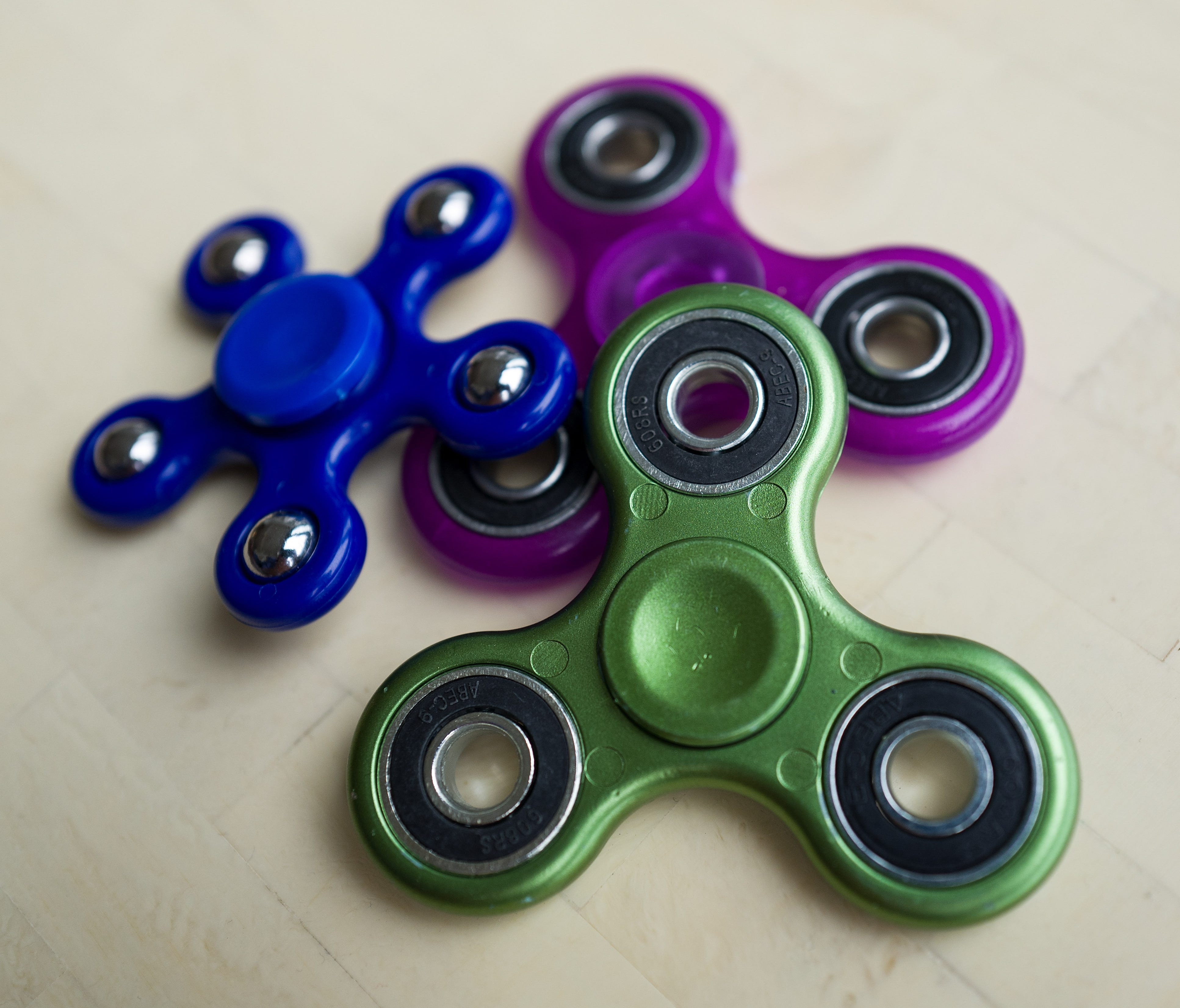 In this photo illustration. a view of fidget spinners. These are not the specific ones in which lead was purported to have been found