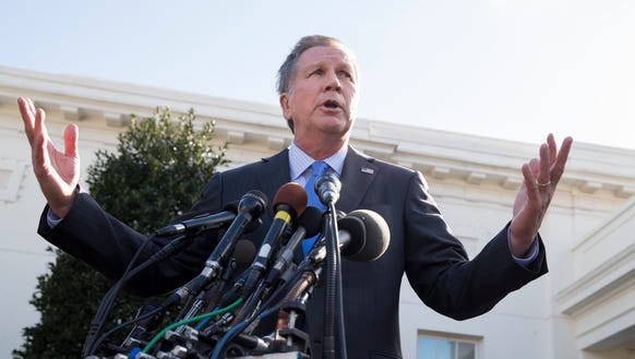 Ohio Gov. John Kasich responds to questions from members