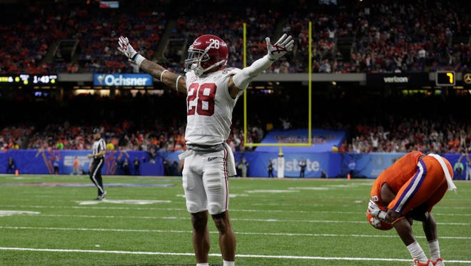 Jan 1, 2018; New Orleans, LA, USA; Alabama Crimson Tide defensive back Anthony Averett (28) and Clemson Tigers wide receiver Deon Cain (8) react after a play during the fourth quarter in the 2018 Sugar Bowl college football playoff semifinal game at Mercedes-Benz Superdome. Mandatory Credit: Derick E. Hingle-USA TODAY Sports