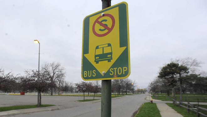 A DDOT bus stop sign.