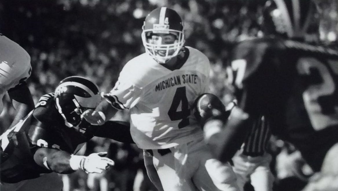 Michigan football hiring ex-MSU QB Dan Enos as an assistant coach