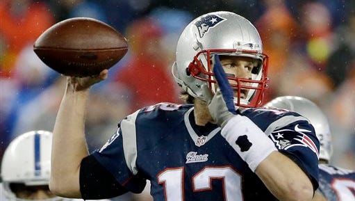 FILE - In this Jan. 18, 2015, file photo, New England Patriots quarterback Tom Brady looks to pass during the first half of the NFL football AFC Championship game against the Indianapolis Colts  in Foxborough, Mass. The NFL suspended Brady for the first four games on Monday, May 11, 2015, for his role in a scheme to deflate footballs used in the AFC title game. (AP Photo/Matt Slocum, File)