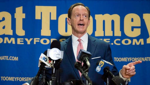 FILE - In this Oct. 11, 2016, file photo, Sen. Pat Toomey, R-Pa., campaigns in Villanova, Pa. Control of the Senate hung in the balance Nov. 5 as candidates from Nevada to New Hampshire made their closing pitches to voters after a tough and costly campaign.