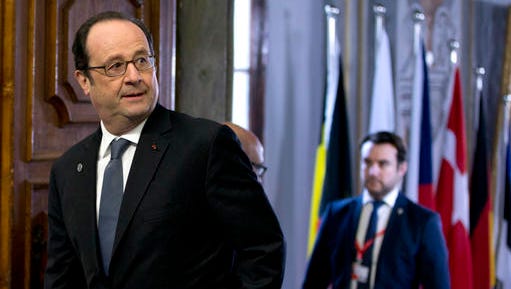 French President Francois Hollande, left, arrives for an EU summit round table meeting at the Grand Masters Palace in Valletta, Malta, on Friday, Feb. 3, 2017. European Union heads of state and government gathered Friday for a one day summit to discuss migration and the future of the EU.