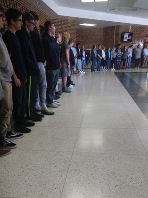 Robert E. Lee High School participated in National School Walkout Day on March 14, 2018. Nearly 100 people walked out of class and stood around the interior of the school.