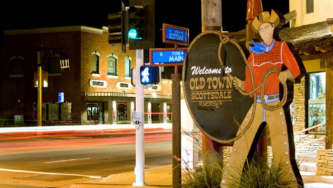 Old Town Scottsdale is shown at night.