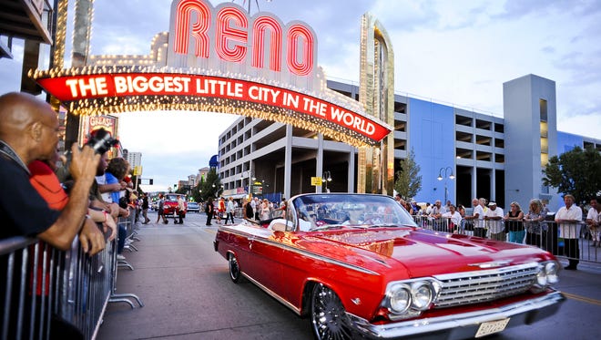 Cars pass under the Reno Arch during the Hot August Nights Cruise in 2013.