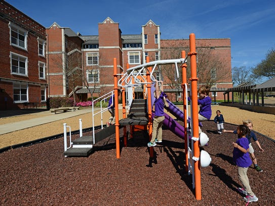 Students at NSU Elementary Lab School play outside