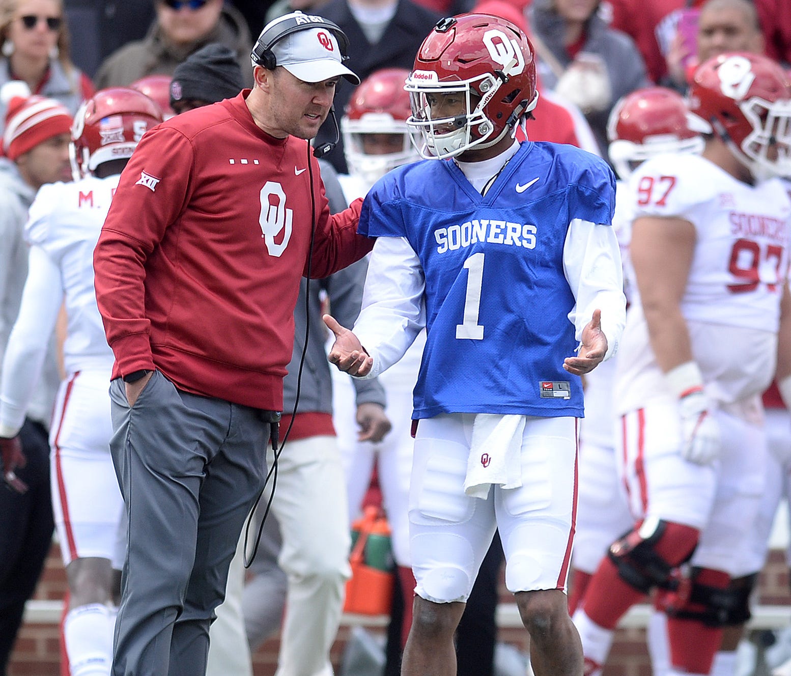 Oklahoma coach Lincoln Riley speaks to quarterback Kyler Murray during the team's spring game at Gaylord Family Memorial Stadium.