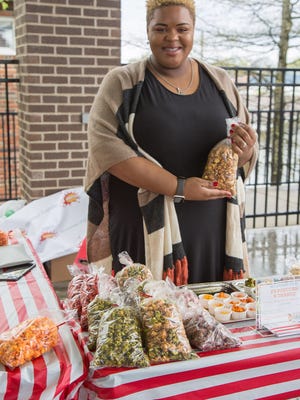 Kaneisha Scott represents KB Popcorn during the Gallatin Farmers Market last year.