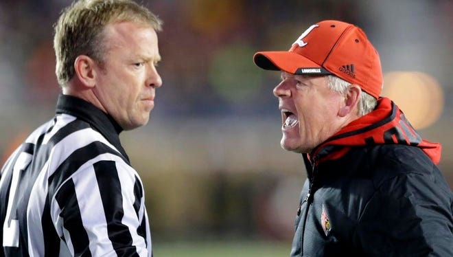 How Louisville Kentucky And Wku Football Coaches Salaries Measure Up