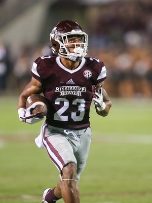 Mississippi State's Keith Mixon (23) runs away from the LSU defense for a third-quarter touchdown. Mississippi State and LSU played in an SEC college football game on Saturday, September 16, 2017 at Davis Wade Stadium in Starkville. Photo by Keith Warren (Mandatory Credit)
