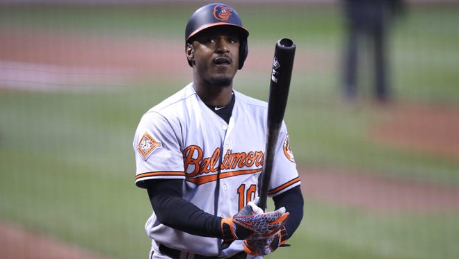 Seventy years after baseball welcomed Jackie Robinson, fans in Boston called Adam Jones the N-word and threw a bag of peanuts at him