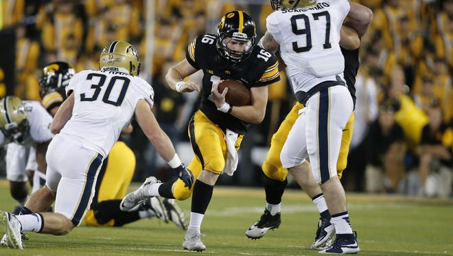 Iowa quarterback C.J. Beathard threw a career-high 40 passes and rushed eight times against  Pittsburgh. He took an unofficial 13 direct hits vs. the Panthers.