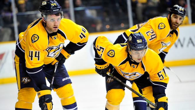 Predators defenseman Cody Franson (44), forward Gabriel Bourque (57) and forward Eric Nystrom are shown in the second period Tuesday.