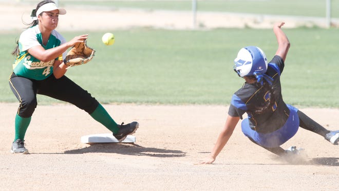 At left, Coachella Valley High School's Beyonce Mondragon fails to make a play at second during their wildcard CIF game against Moreno Valley in Thermal on May 15, 2018. Coachella Valley lost the game as their season comes to and end. 